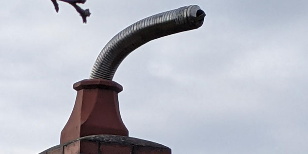 installation of a chimney cowl with a new flue